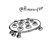 A circular tray robot with little eyes on the front, loaded with puff pastry canapés of some kind and with six banded legs on the bottom.