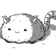 A happy, dome-shaped robot covered in soft fur. It has two bovine-like ears poking out that it's waggling and four wheels on its underside. It has a banded tail emerging from its rear that is curling upwards. The robot is also shedding hair all over the place.