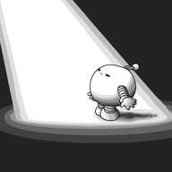 A spherical robot with banded arms and legs and a zigzag antenna, standing in a bright spotlight, squinting up at its source.
