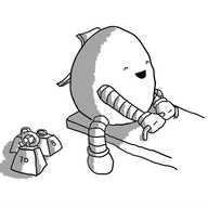 A happy, egg-shaped robot sitting on one end of a see-saw. A hatch on its back is open and a collection of small trapezoid weights are on the ground next to it.