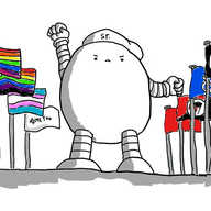 An ovoid robot standing tall with a determined expression and a fist raised. It is wearing a beret that says "s.r." on it and is flanked by flags of Pride, Black Pride, Trans Rights, #MeToo, Black Lives Matter, Disability Rights, AntiFa and Socialism.