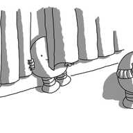 Two spherical robots with banded arms and legs. One is covering its eyes with its hands while the other is badly hiding behind a set of curtains about three feet behind it, peeking out from the gap in between.