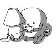 A spherical robot with jointed arms and legs, kneeling on the ground and holding a lamp, on which it is drawing a smiley face. The robot has an expression of intense concentration on its own face.